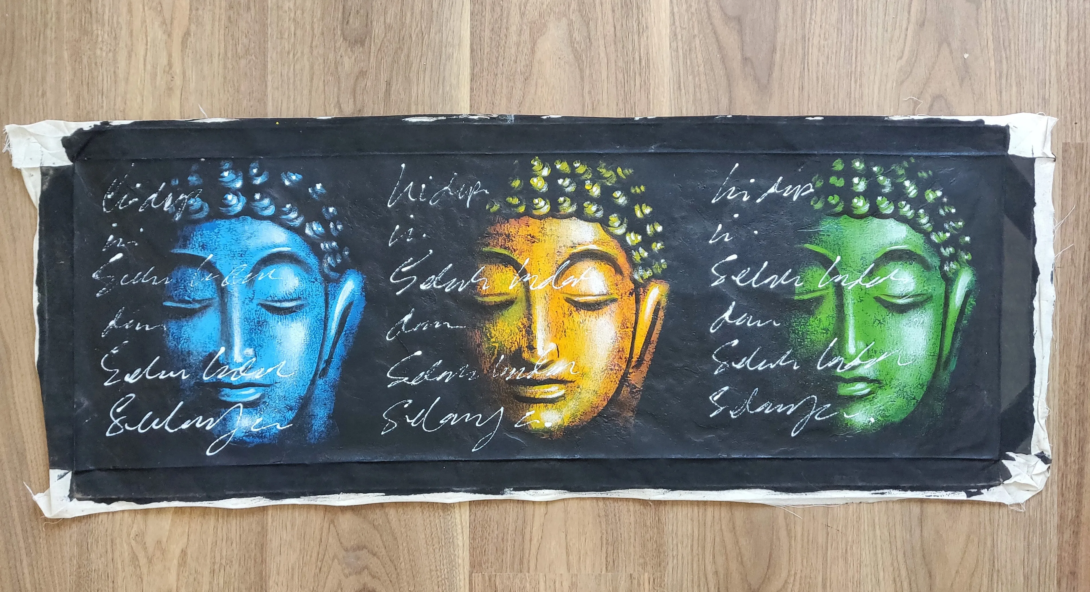 Home Decor: Wall Hangings.
Hand Painted Lord Buddha Serene face motifs - Wonder, Silence, Gratitude. Size 98 by 37 cm. Unframed