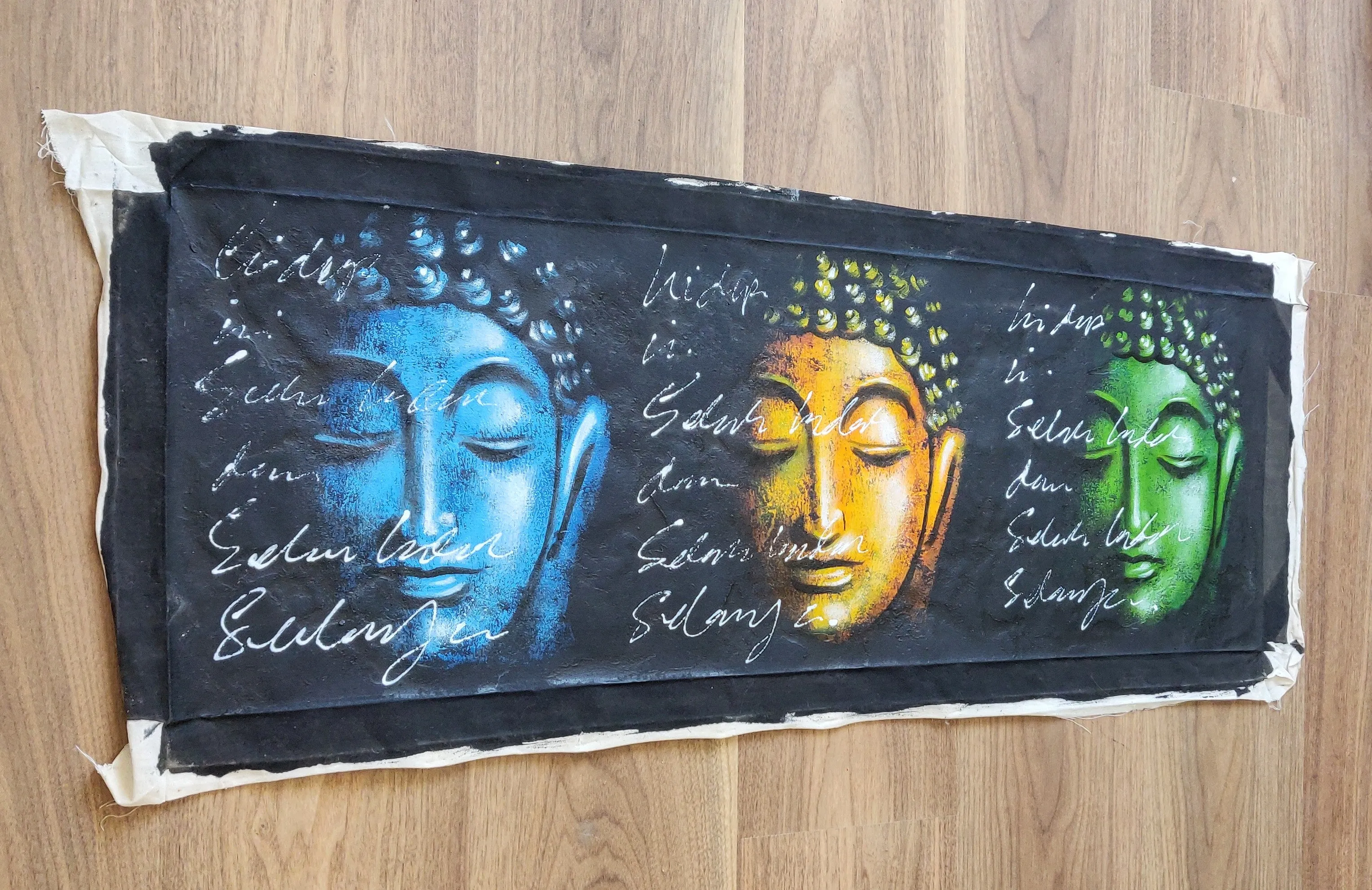 Home Decor: Wall Hangings.
Hand Painted Lord Buddha Serene face motifs - Wonder, Silence, Gratitude. Size 98 by 37 cm. Unframed