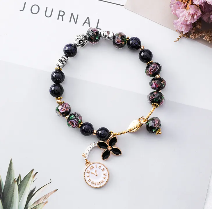 Retro flower crystal bracelet female simple ethnic wind clock leaf bracelet personality bracelet girlfriends students